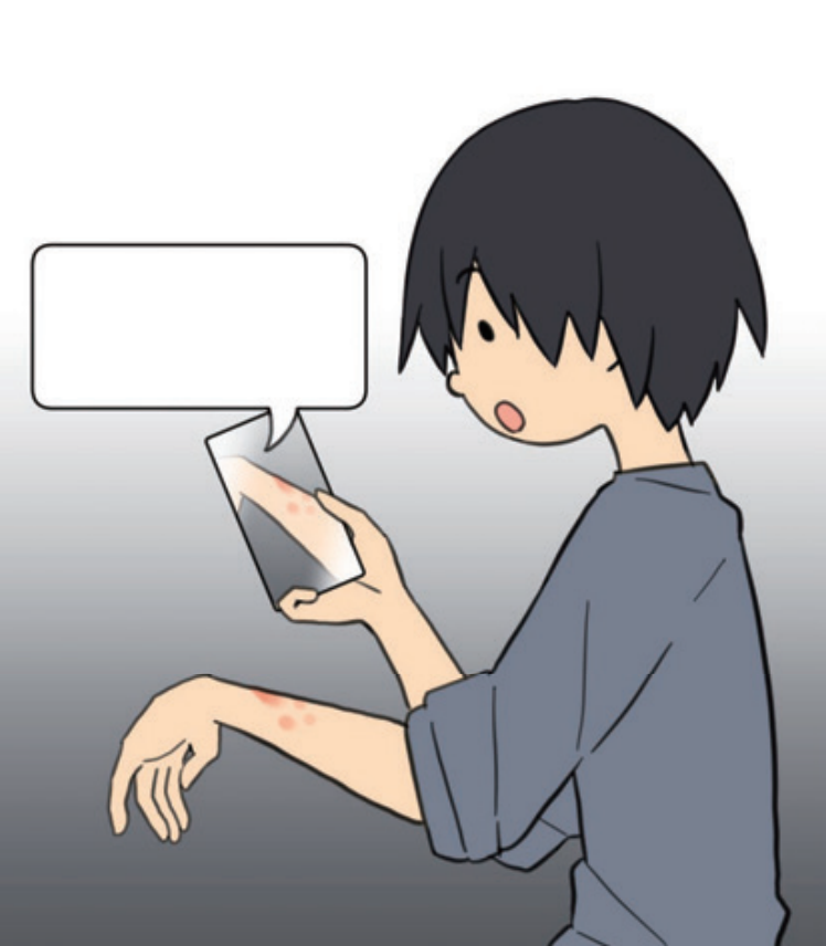 怪我した腕を撮る様子