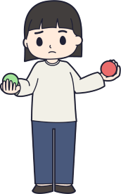 赤玉と青玉を比べている男の子の画像